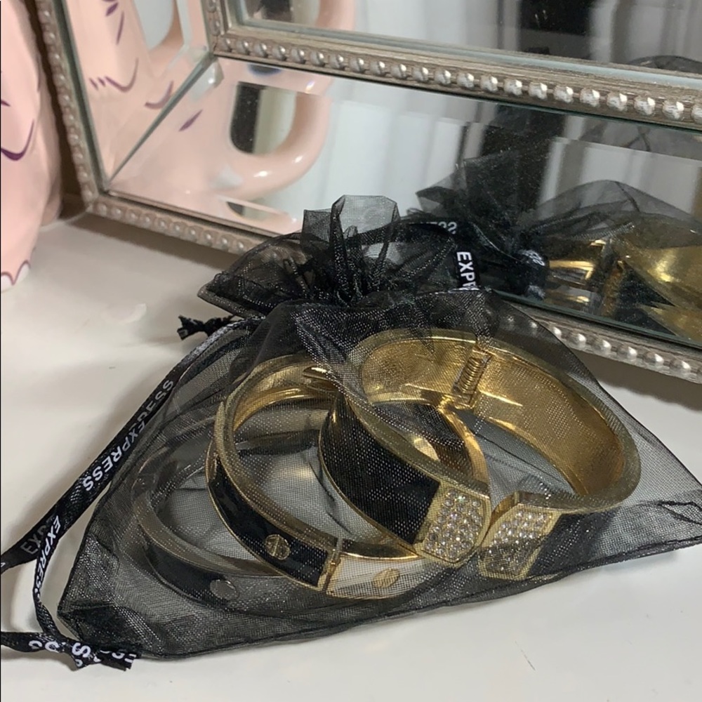 Gold, Silver, and White Bracelets - Picture 2 of 2